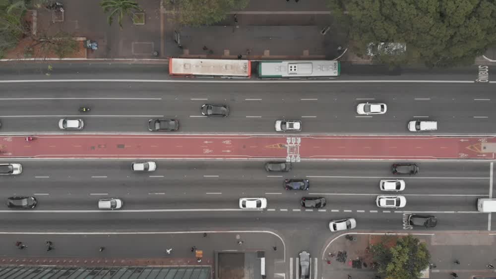 Overhead view of cars and buses on a city road